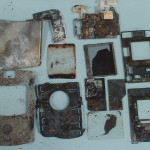 exhibit-412-burnt-cell-phone-pieces